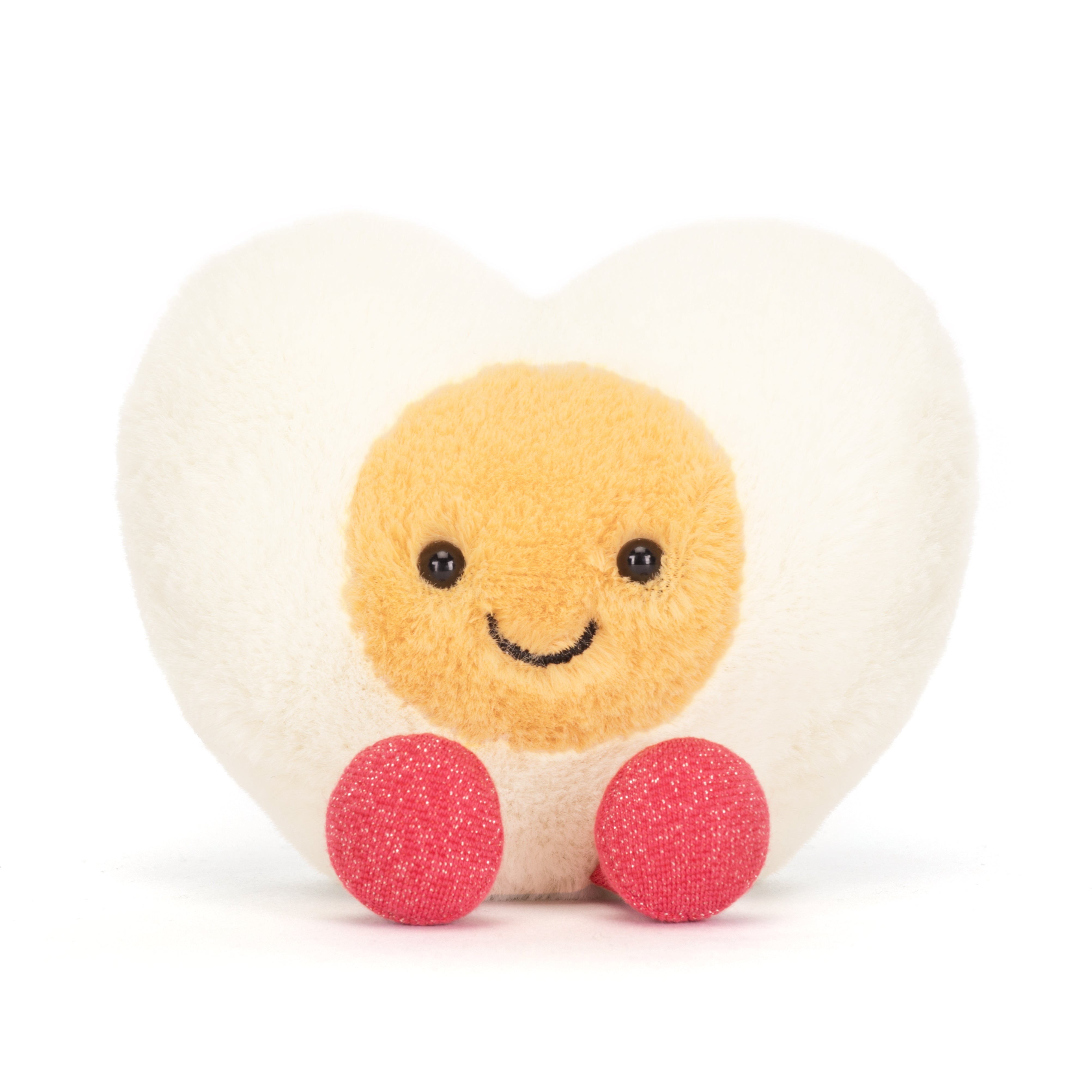 Peluche Jellycat œuf cœur amusant sur lit – Jellycat heart egg plush on bed – Olie & co