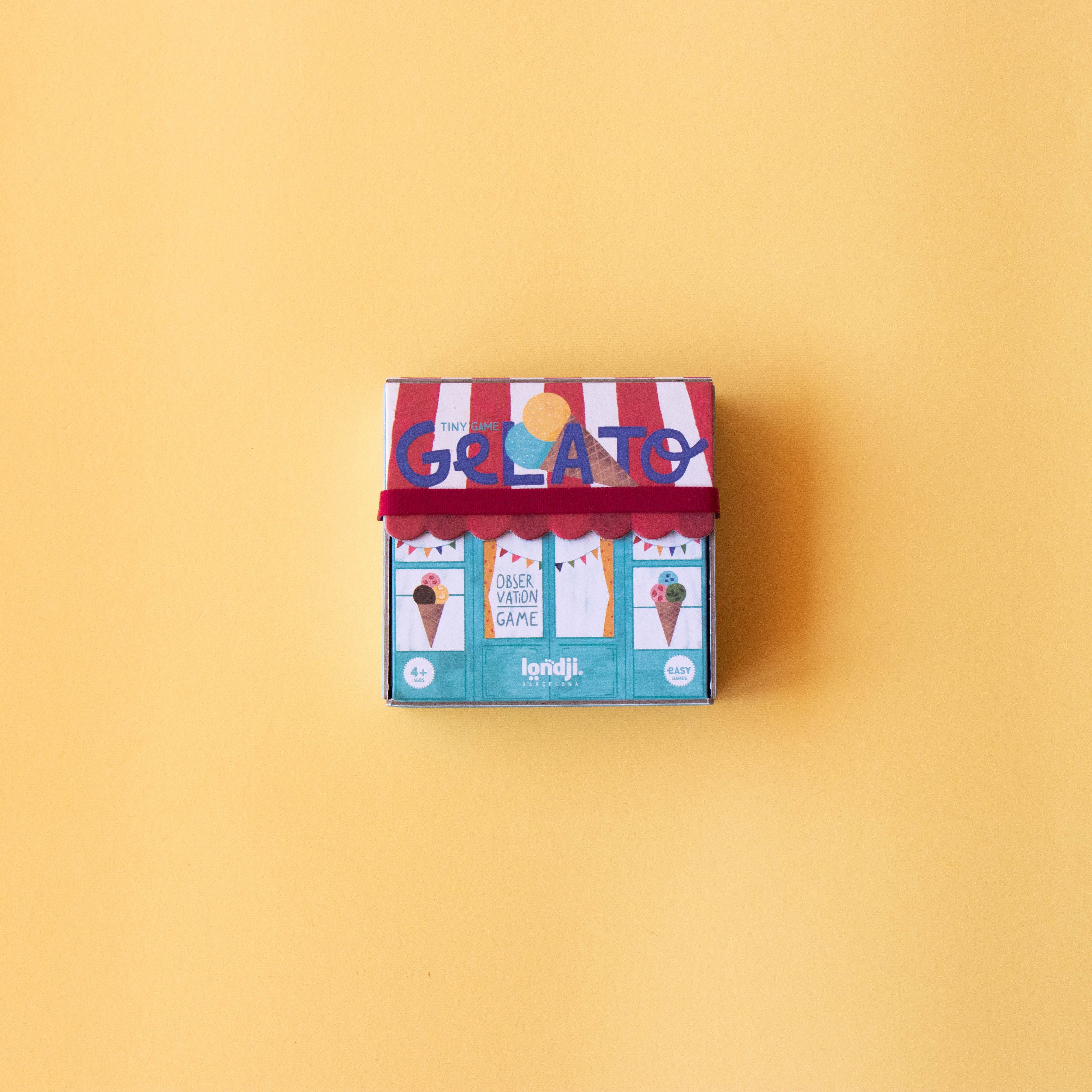 Mini jeu d’observation Gelato Londji avec cartes colorées et jetons sur table – Mini Gelato observation game Londji with colorful cards and tokens on table – Olie & co