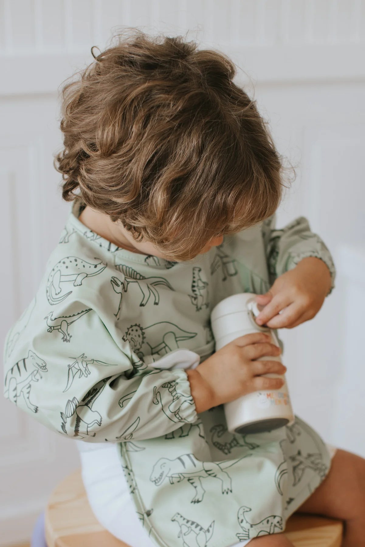 Bavoir à manches longues | Dinosaures