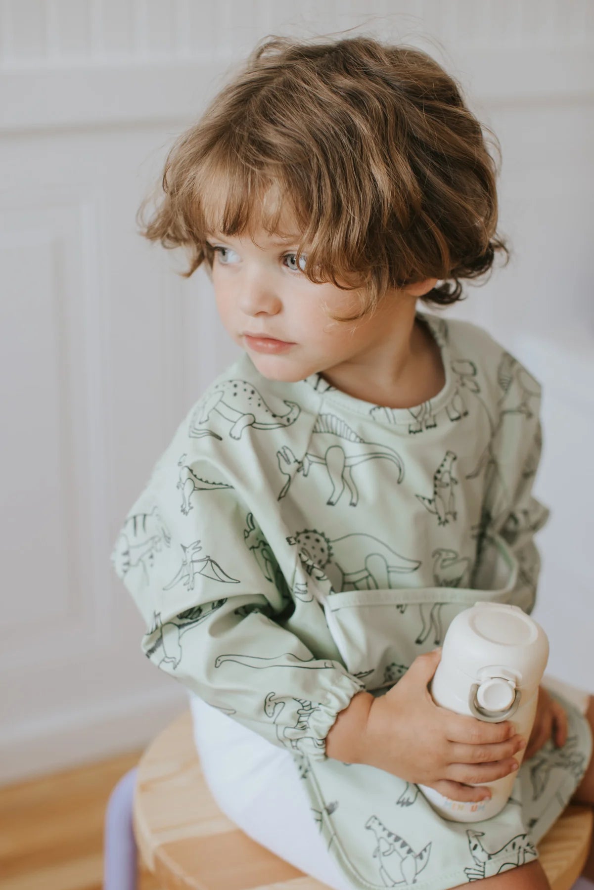 Bavoir à manches longues | Dinosaures