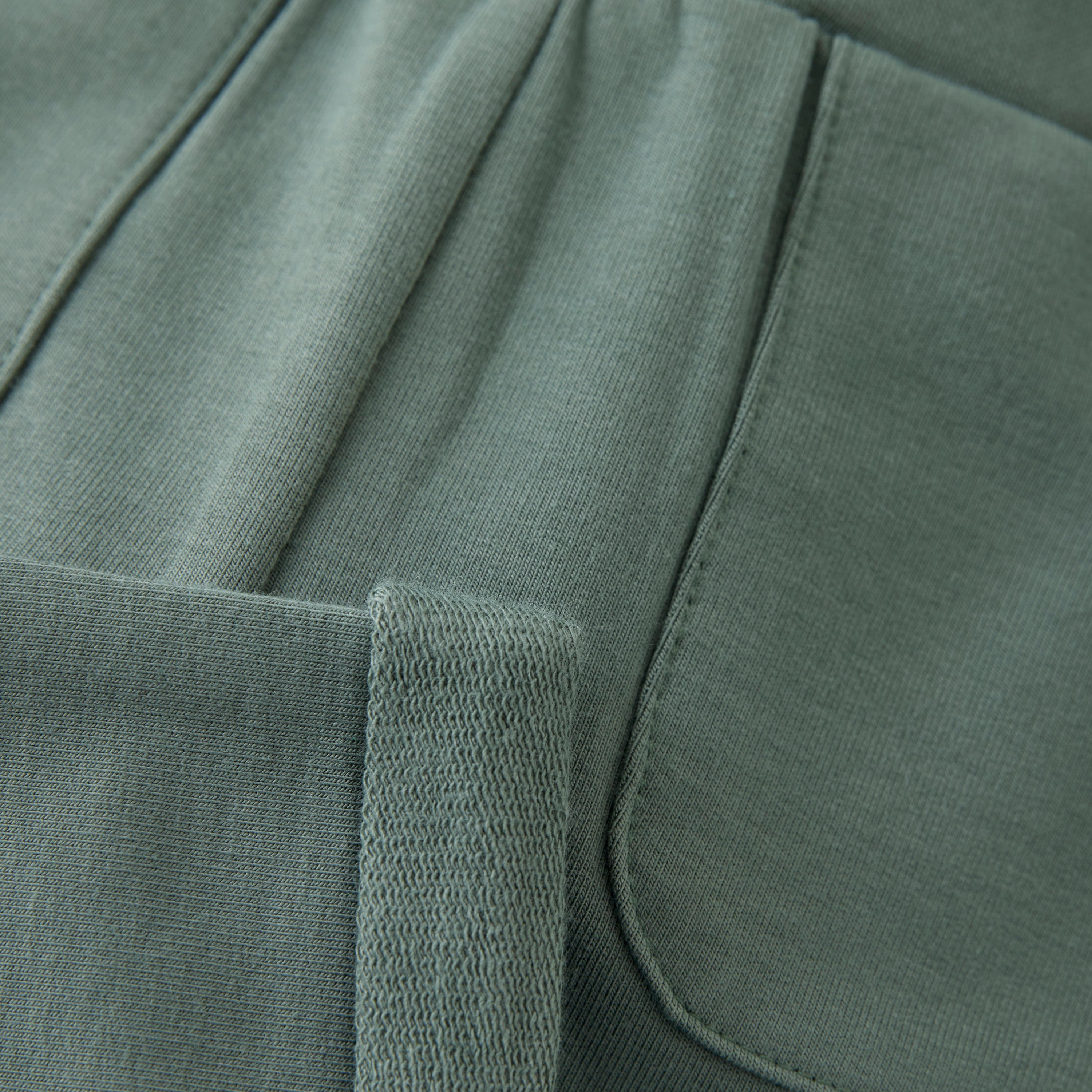Pantalon sweat vert Fixoni – doux, extensible et certifié OEKO-TEX®, avec poches et taille élastique, Olie & co