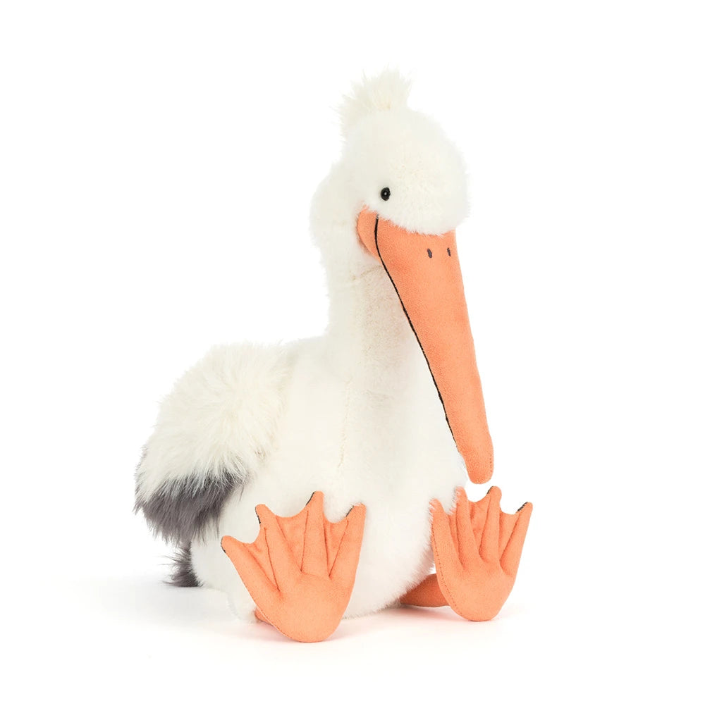 Peluche Jellycat Keli le pélican avec long bec, grandes ailes souples et pattes orange – Jellycat Keli Pelican plush with long beak, soft wings and orange feet – Olie & co