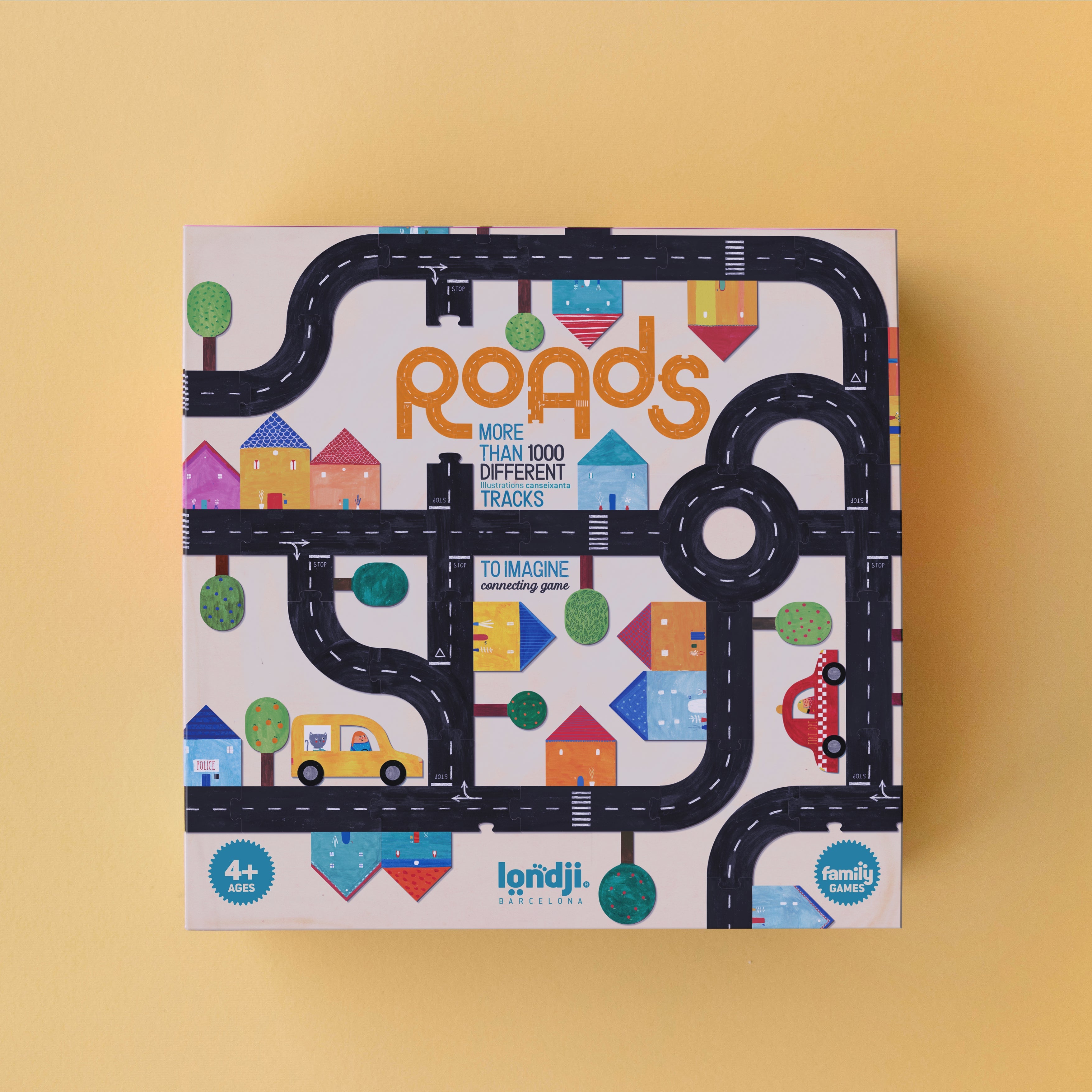 Jeu d’assemblage Roads Londji avec routes en bois et voitures sur table – Londji Roads assembly game with wooden roads and cars on table – Olie & co